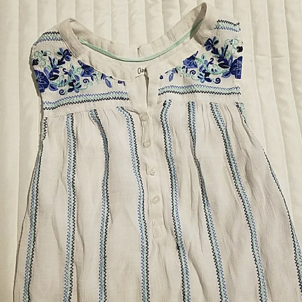 white tank top with blue design